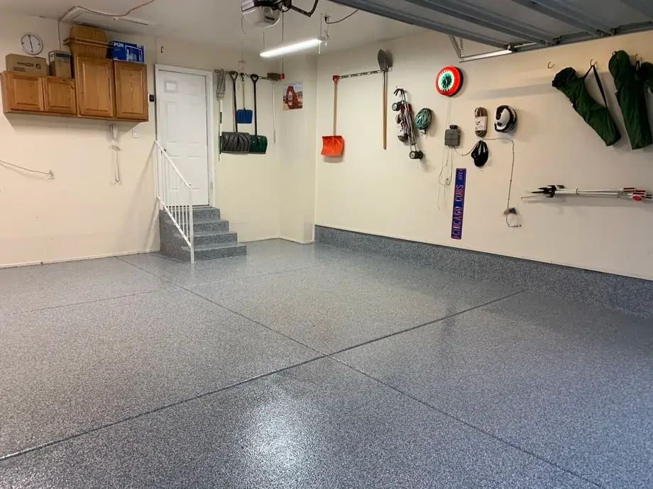 An after photo of an equipment storage room with a professionally coated concrete floor.
