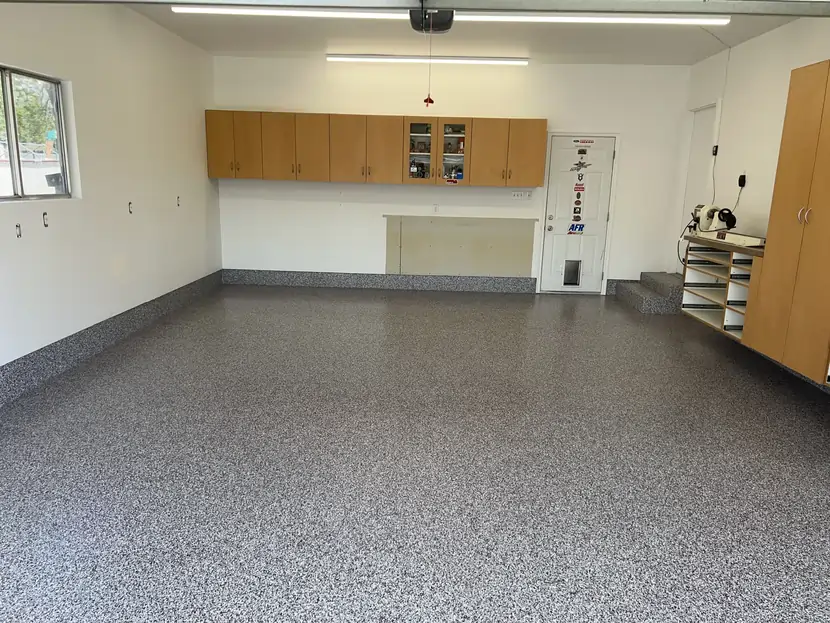 An after photo of a white room with a professionally polished concrete floor 